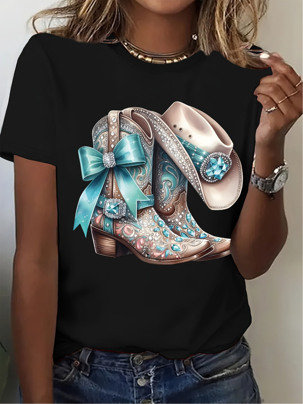 Stylish black t-shirt featuring colorful cowboy boots and hat with a blue ribbon, perfect for casual wear.