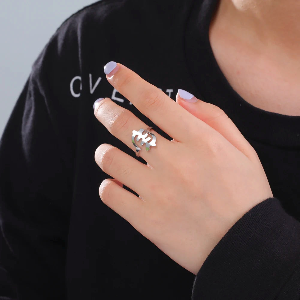 Stylish woman wearing a stainless steel African map gold ring, suitable for daily fashion jewelry.