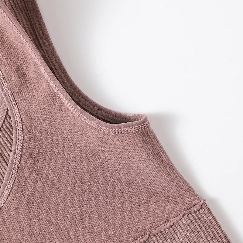 Close-up of the seamless ribbed neckline of the RibSculpt™ camisole in soft mauve color.