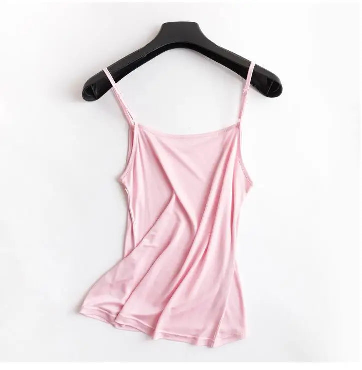 Lightweight pink HalterSilk™ U-Neck cami hanging on a black hanger, perfect summer wear for women.