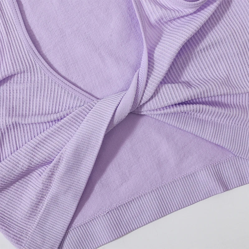 DeepVibe™ Deep V ribbed crop top in lavender color, showcasing seamless design and comfortable knit fabric.