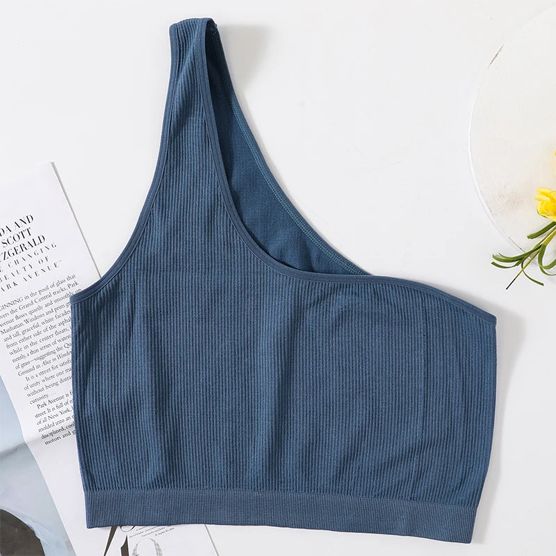 MonoSculpt™ one-shoulder seamless crop top in blue, crafted from soft nylon and spandex, perfect for streetwear style.