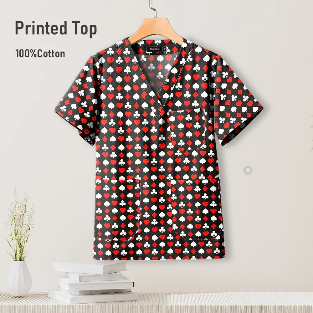 Pediatric nursing scrub top featuring a playful heart print design, made from 100% cotton, women's V-neck style.