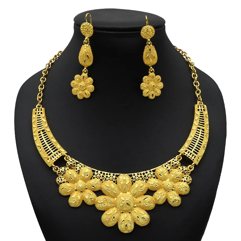 Luxury Indian bridal necklace set with floral design and matching earrings, 24K gold plated fashion jewelry.