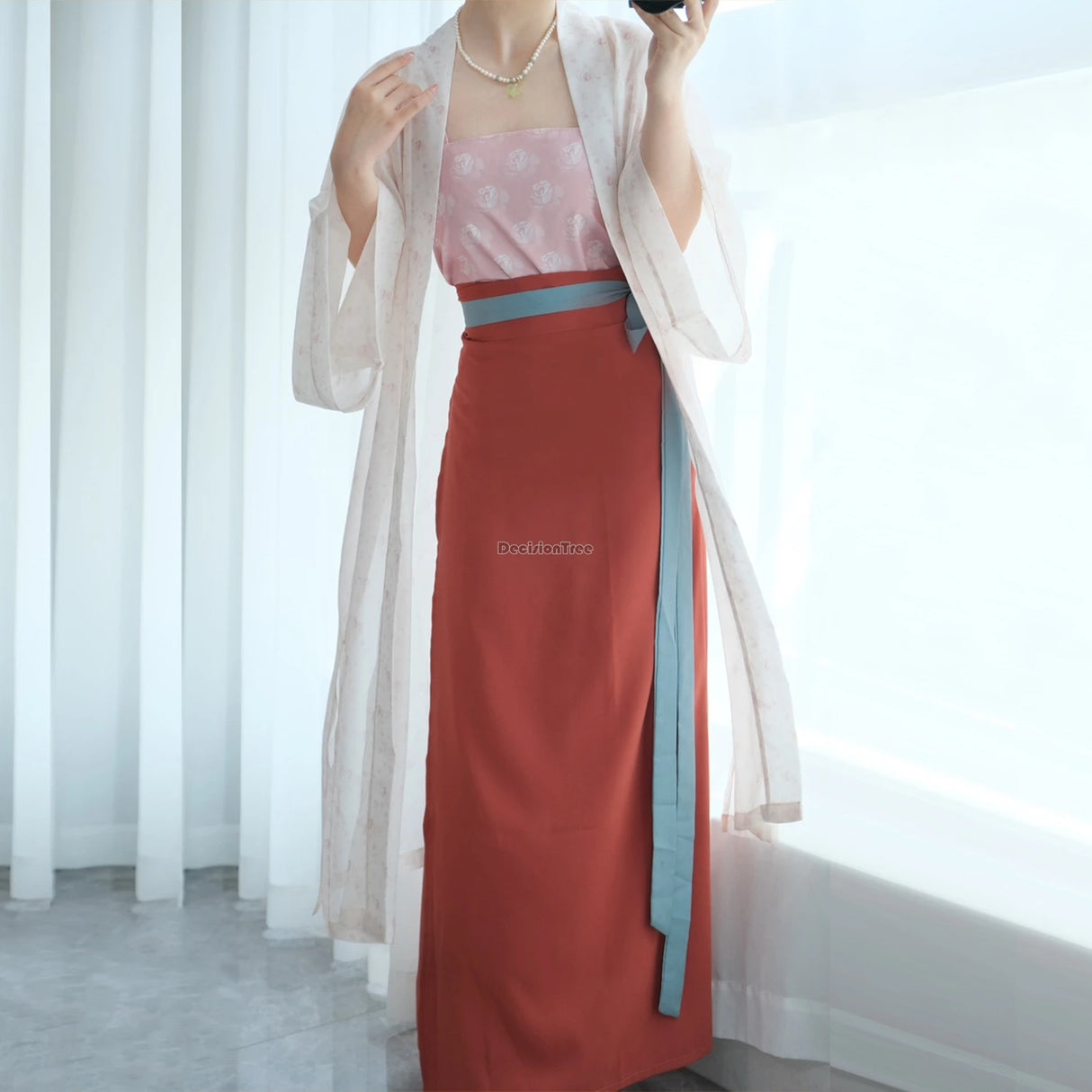 Song Dynasty Hanfu three piece outfit for women featuring floral design, elegant layering, and a stylish belt.