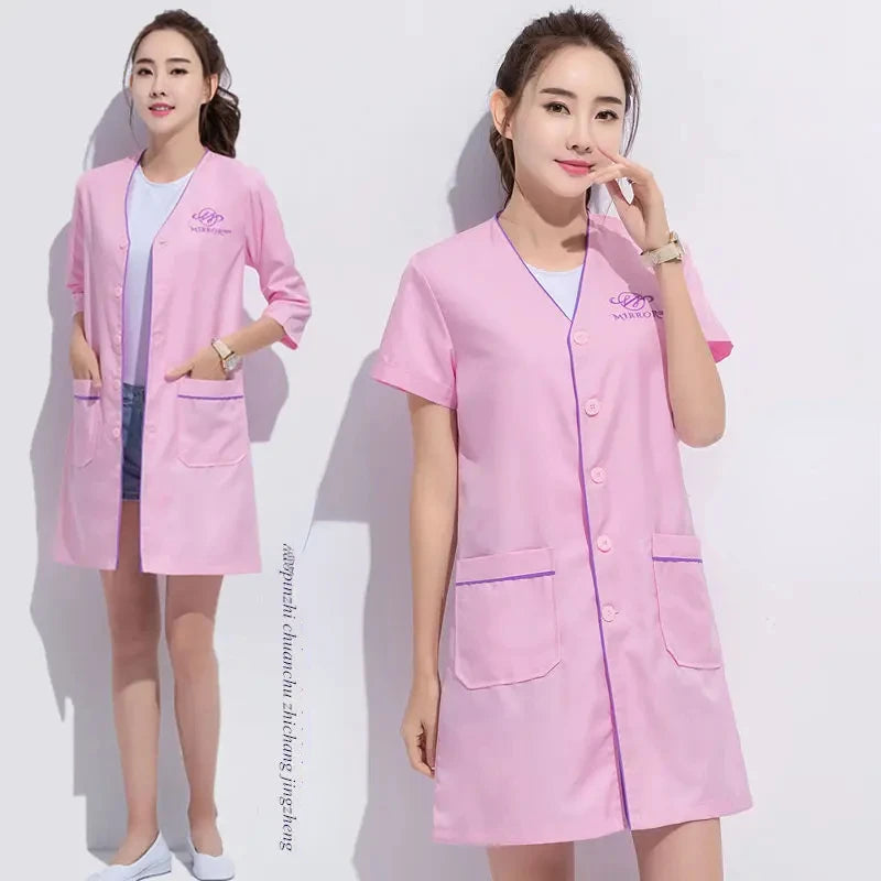 Custom pink spa beauty uniform for women featuring short sleeves and pockets, perfect for salons and medical settings.