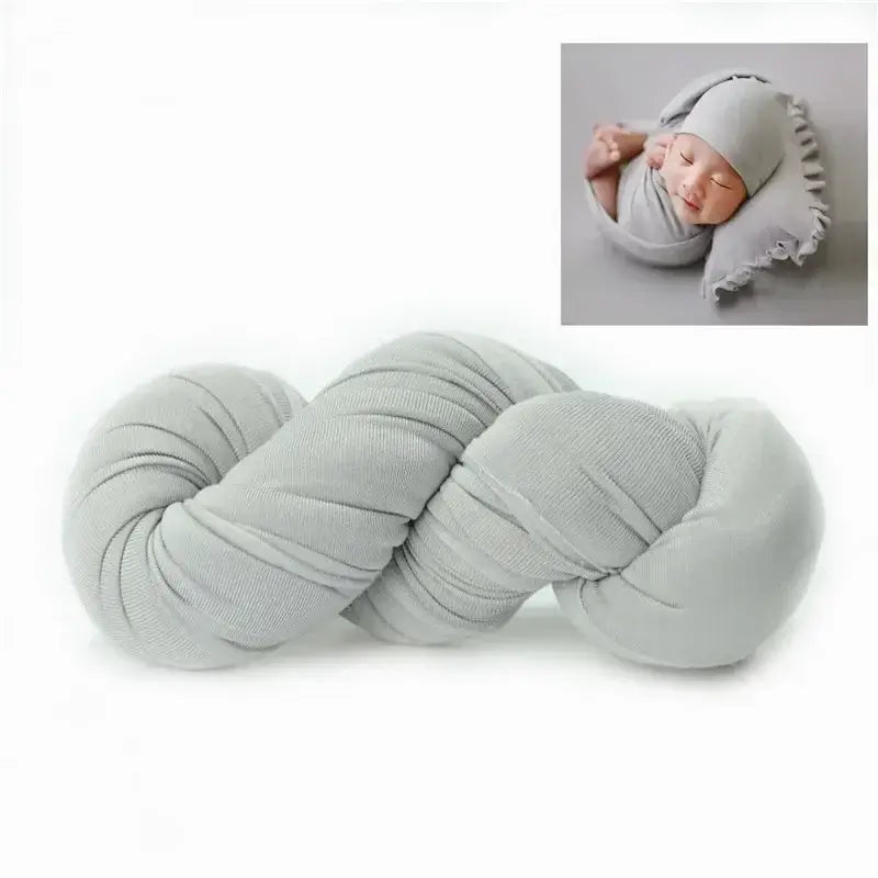 Soft gray blanket photo shoot backdrop for baby, ideal for unisex newborn photography, made from polyester.