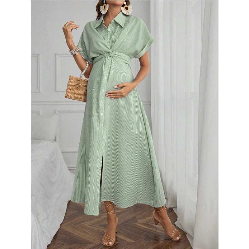 Light green striped maternity shirt dress with short sleeves, perfect for casual summer outings and comfortable fit.