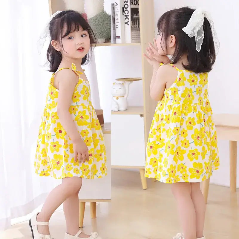 Adorable summer girls dress featuring bright yellow floral print, perfect for 4-6 year olds, knee-length and sleeveless.