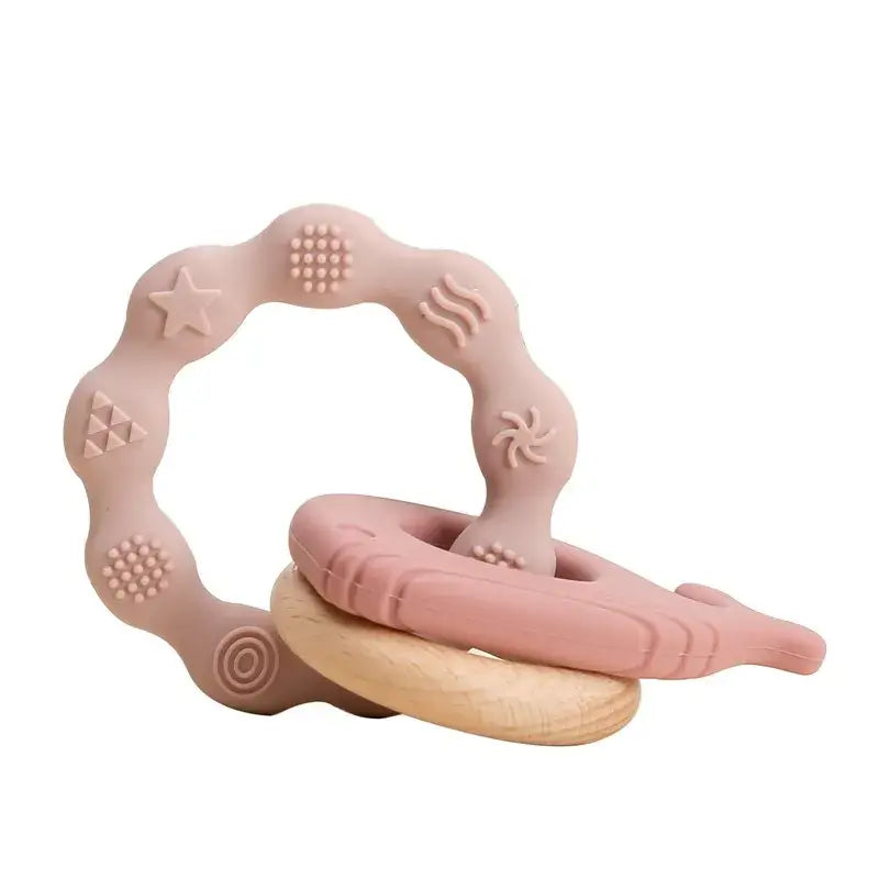 Soft silicone baby teether gloves in pastel colors, designed for relieving tooth pain, featuring textured surfaces.