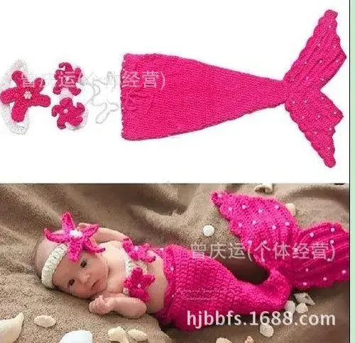 Cute unisex baby in pink mermaid costume with starfish headband, perfect for ages 0-6 months. Ideal for playful photography.