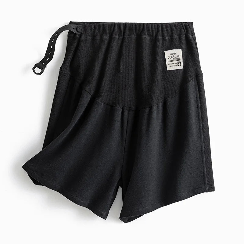 Black plus size adjustable maternity shorts, loose fit, perfect for summer, made of comfortable polyester.