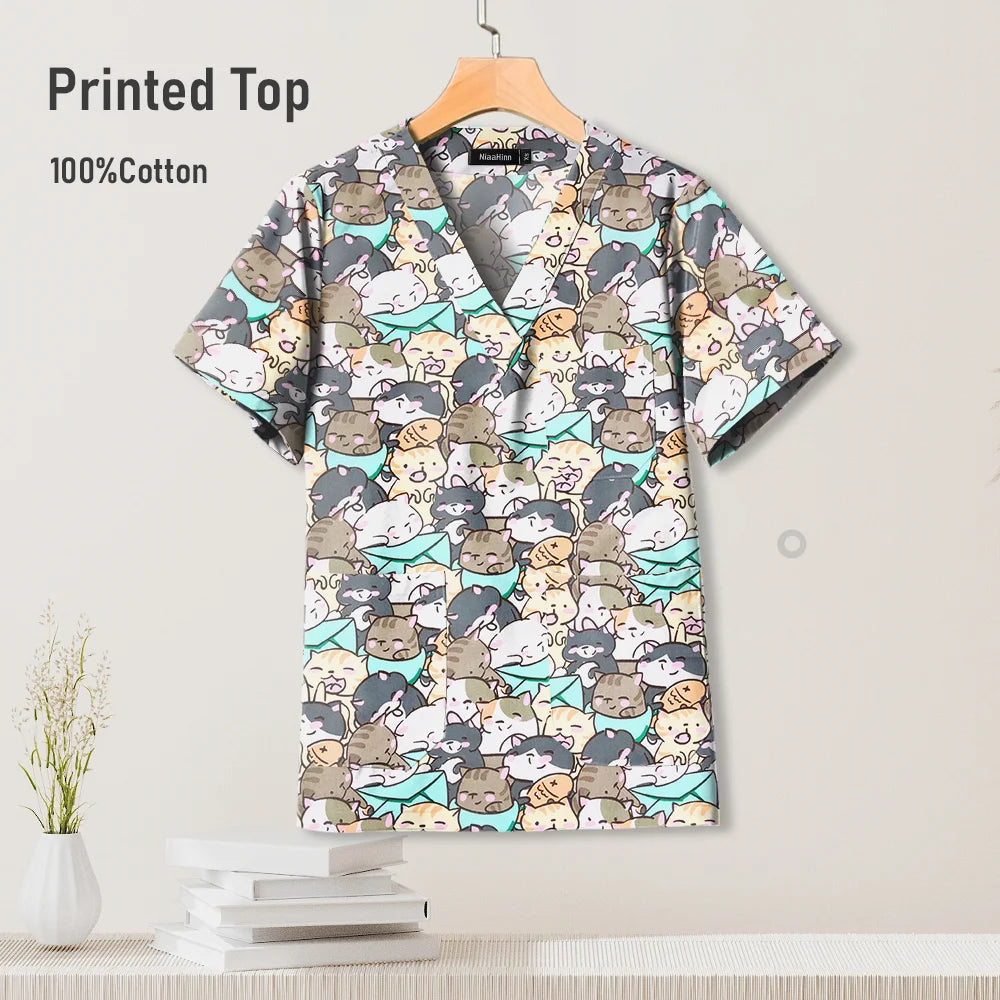 Colorful printed top made of 100% cotton, featuring a playful animal design, perfect for pediatric nursing uniforms.
