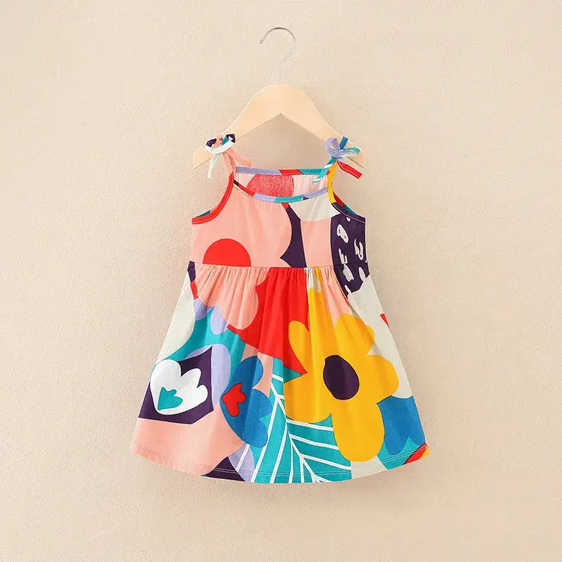 Colorful summer dress for girls featuring floral patterns and sleeveless design, perfect for ages 4-6 years.