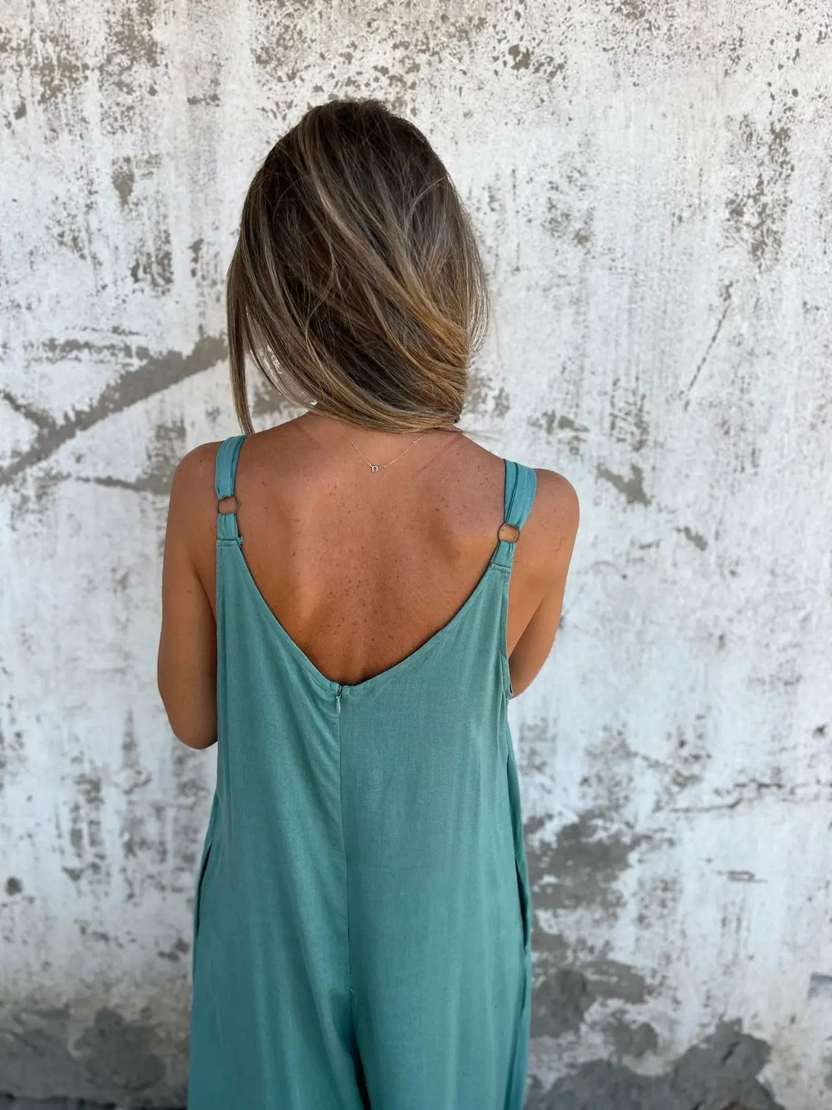 ZenFit™ – V-Neck Wide Leg Sleeveless Jumpsuit (Minimal, Cool & Flexible)