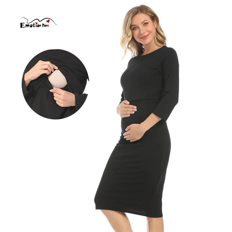 Postpartum nursing maternity dress by Emotion Moms in black, featuring a 3/4 sleeve and breastfeeding functionality.