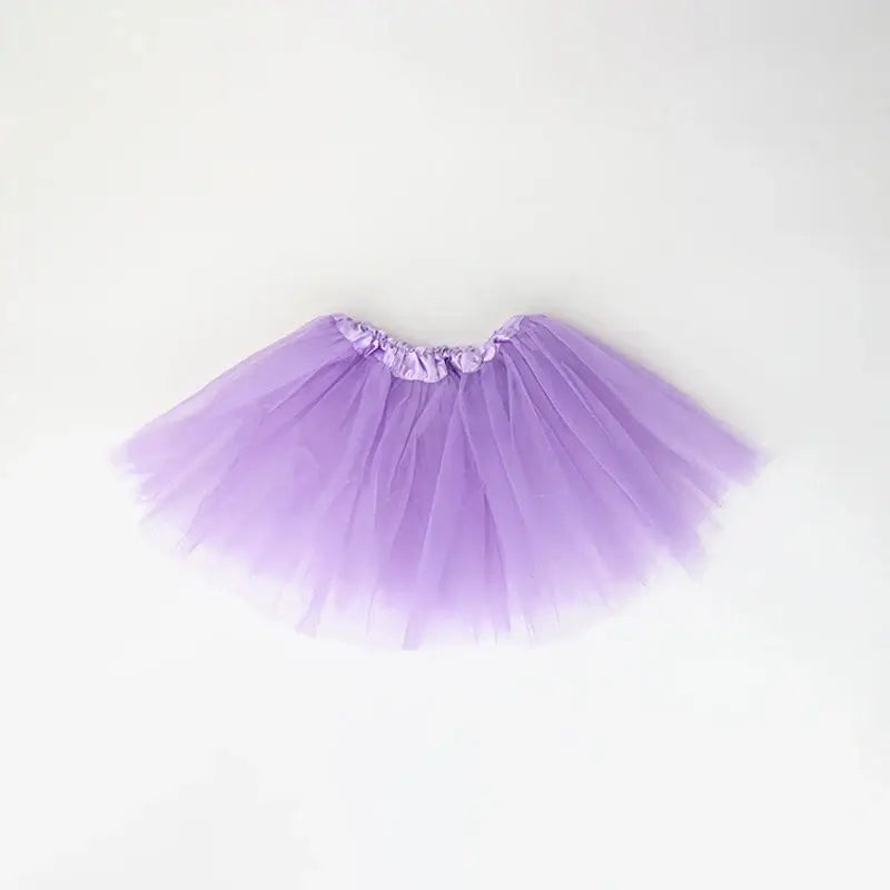 Purple newborn tutu skirt made of soft tulle, perfect for baby girls' summer outfits and special occasions.