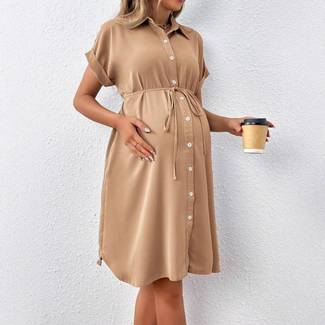 Maternity casual summer dress in solid tan color, featuring a button front and comfortable fit.