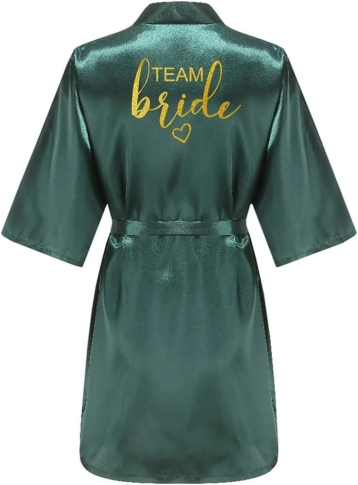 Green satin robe with 'TEAM BRIDE' in gold lettering, perfect for bridal parties and getting ready on wedding day.