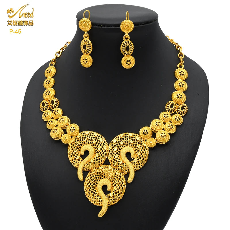 Luxury Indian Bridal Jewelry Necklace Set with matching earrings in 24K gold plated design, perfect for weddings.