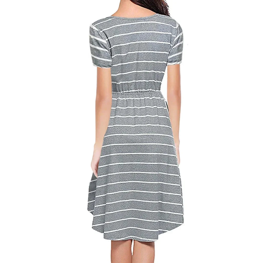 Back view of striped multifunctional nursing dress in natural color, perfect for maternity and baby showers.