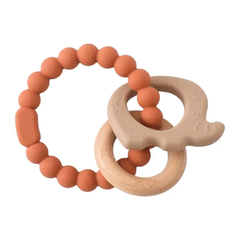 Baby teether gloves featuring silicone and wooden materials, safe for infants to relieve teething pain.