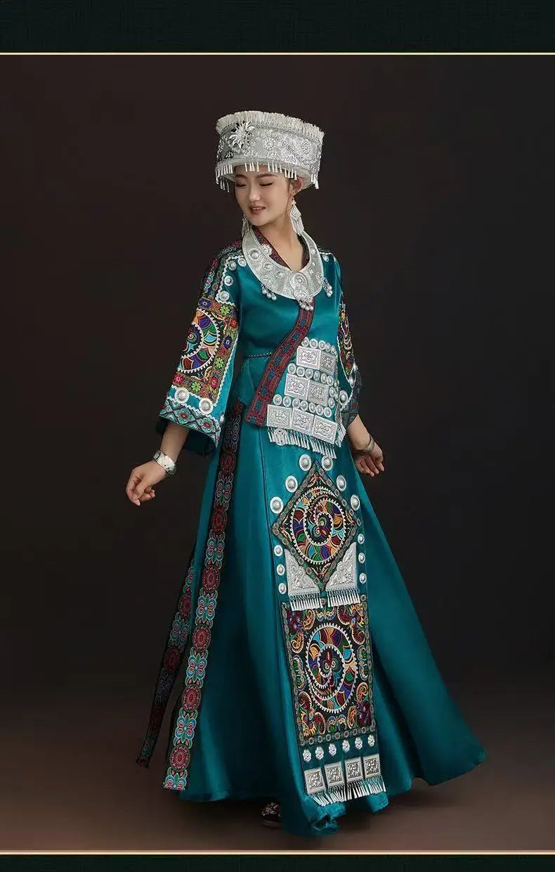Women wearing a beautiful Miao embroidery suit, showcasing intricate patterns and vibrant colors for festival occasions.