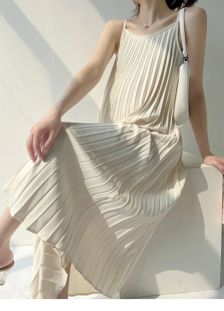 Pleated chiffon maternity dress in natural color, mid-calf length, stylish and comfortable for summer wear.