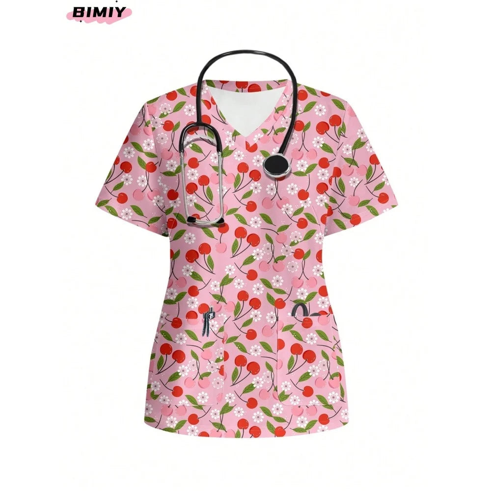 Colorful pink floral nursing scrub top featuring cherries and a stethoscope, ideal for women in medical professions.