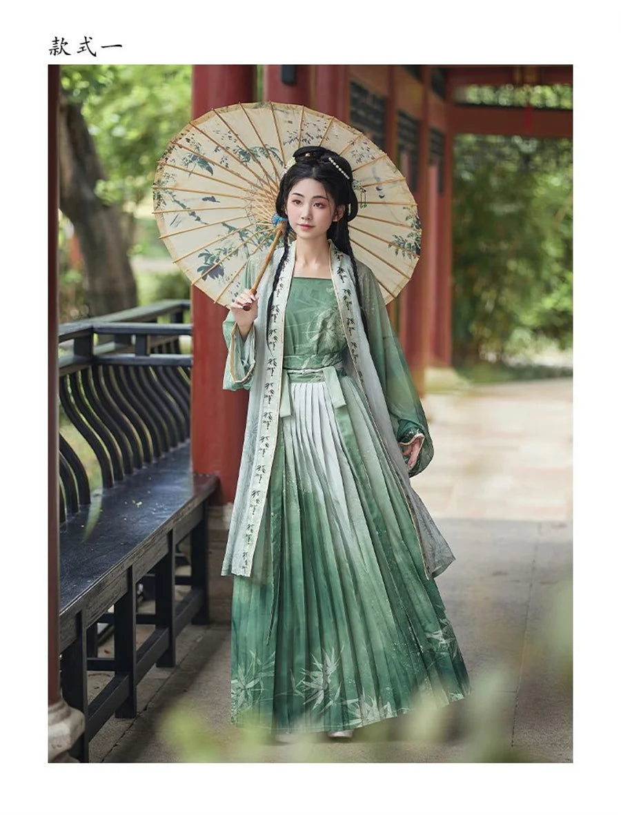 Women’s Hanfu cosplay featuring a beautiful green dress and floral parasol in a serene outdoor setting.