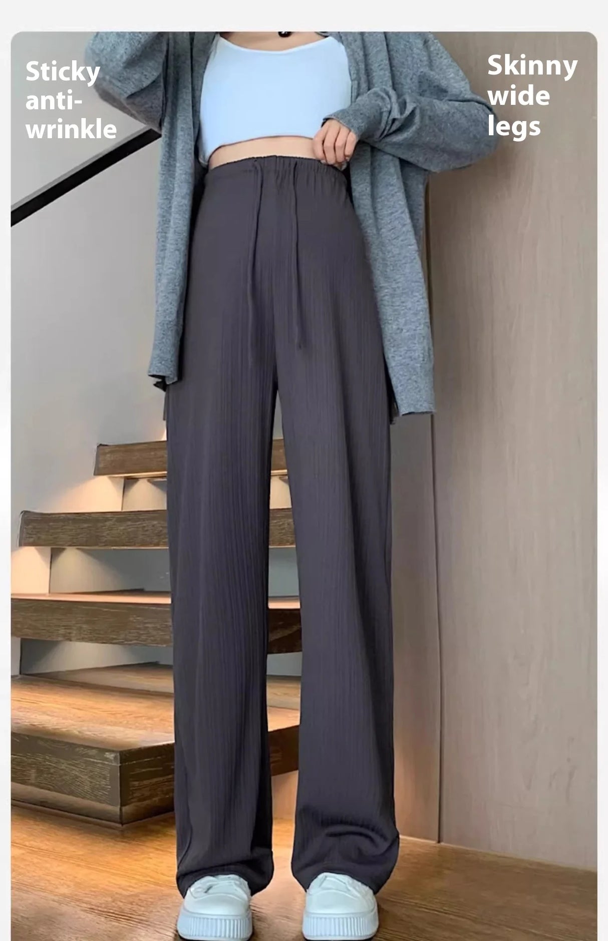 Wide-leg maternity pants with drawstring, featuring a stylish design and comfortable fit.