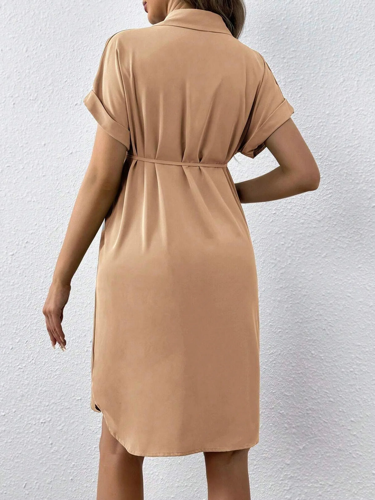 Back view of a casual striped maternity dress with short sleeves and a belted waist, perfect for summer wear.