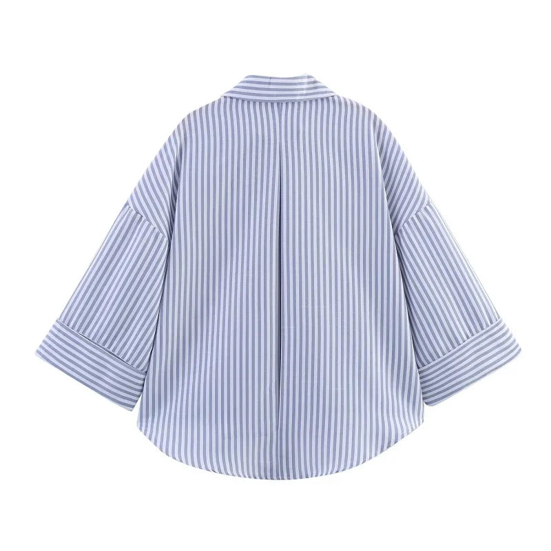 WideLine™ oversized striped shirt with loose fit, back view showing turn-down collar and wide sleeves.
