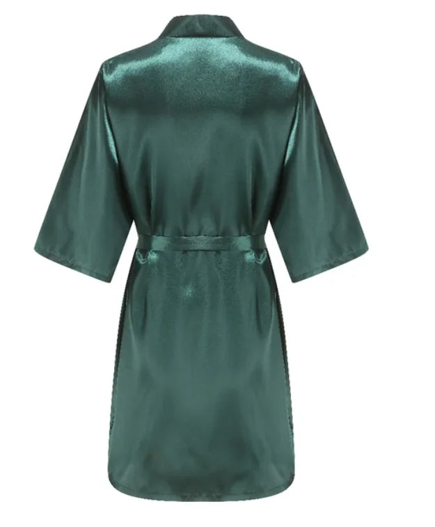 Back view of a knee-length satin robe in deep green color with short sleeves and a tie belt.