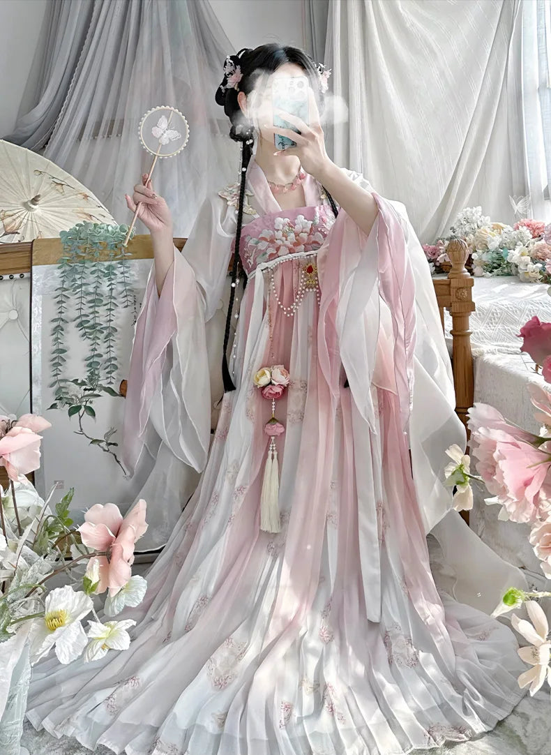 Elegant vintage Chinese style Hanfu dress in pink, designed for women, showcasing traditional fashion and floral details.