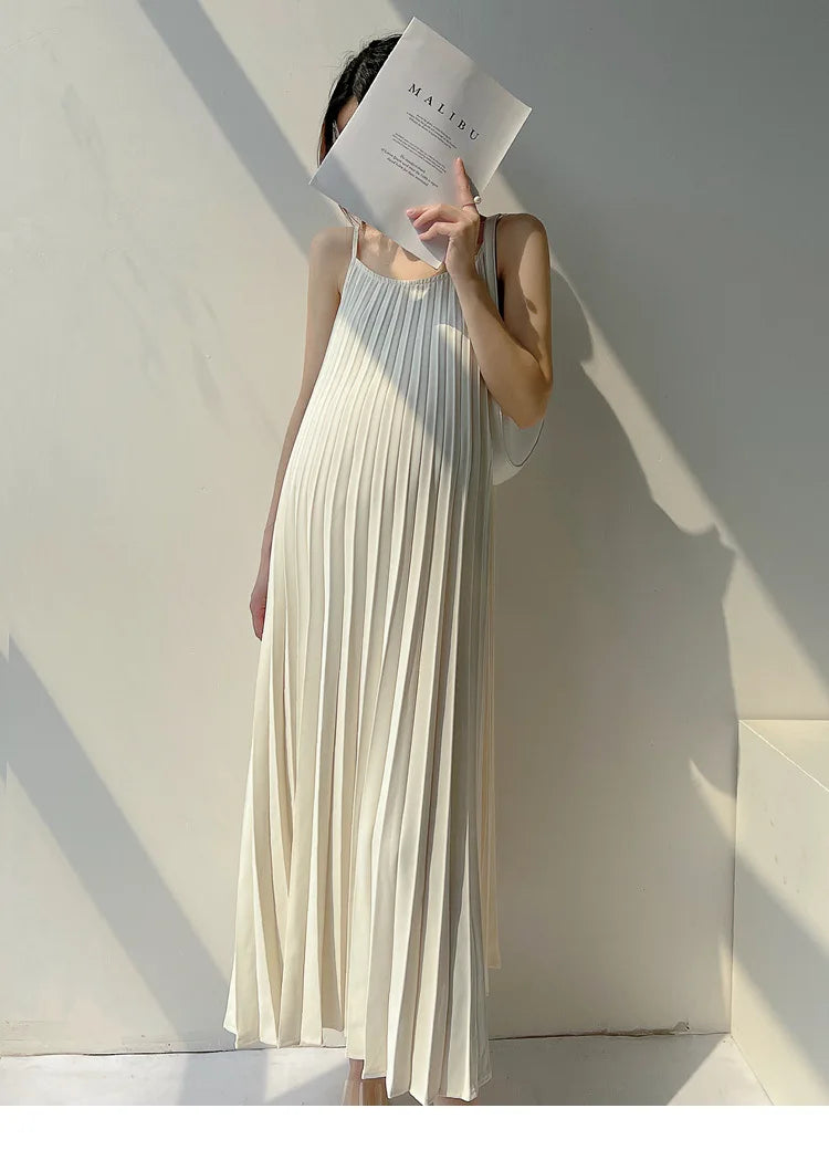 Pleated chiffon maternity dress in natural color, mid-calf length, perfect for summer wear.
