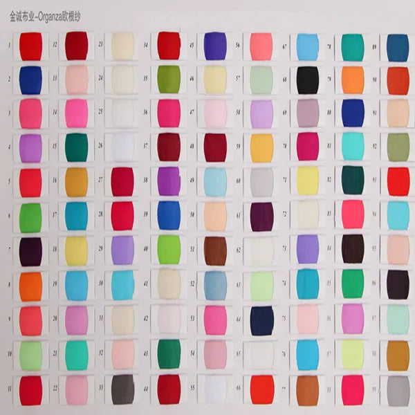 Color swatch chart featuring various organza fabric colors for fashion and design.