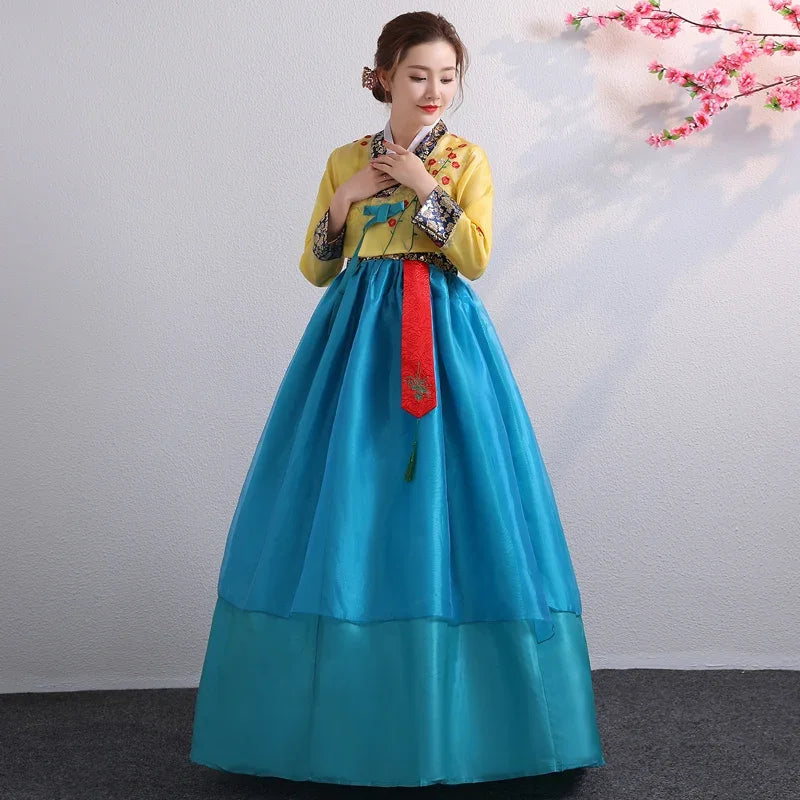 Korean Palace Hanbok dance dress for women in yellow and blue with traditional embroidery details, perfect for cultural celebrations.
