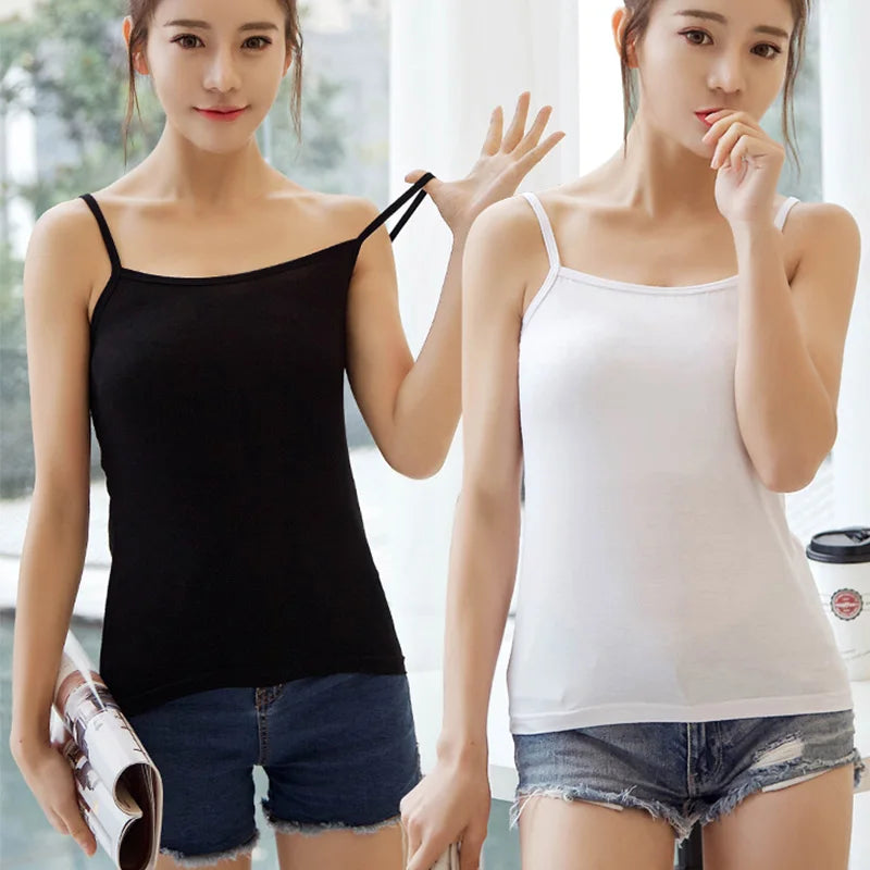 Two women wearing BasicBreeze™ solid cotton strap camis in black and white for casual everyday wear.