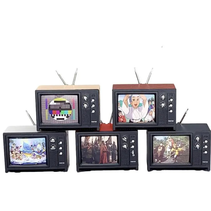 Set of vintage mini TVs displaying colorful cartoons and graphics, perfect for nostalgic decor or photography props.