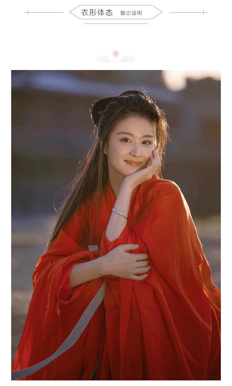 Woman in a traditional red Hanfu dress smiling radiantly, showcasing Chinese cultural cosplay.