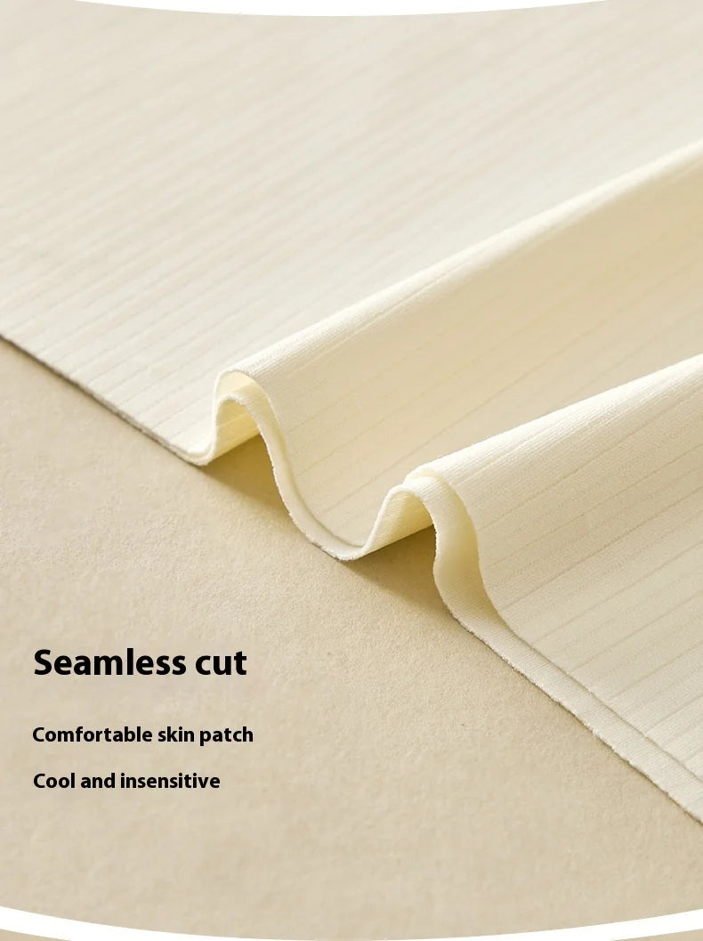 Close-up of seamless cut fabric, showcasing soft texture with comfortable skin patch for lightweight clothing.