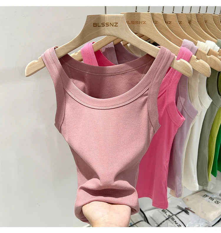 RibFlex™ Basic O-Neck Tank in pink, a comfortable summer crop top for juniors, displayed on a hanger.