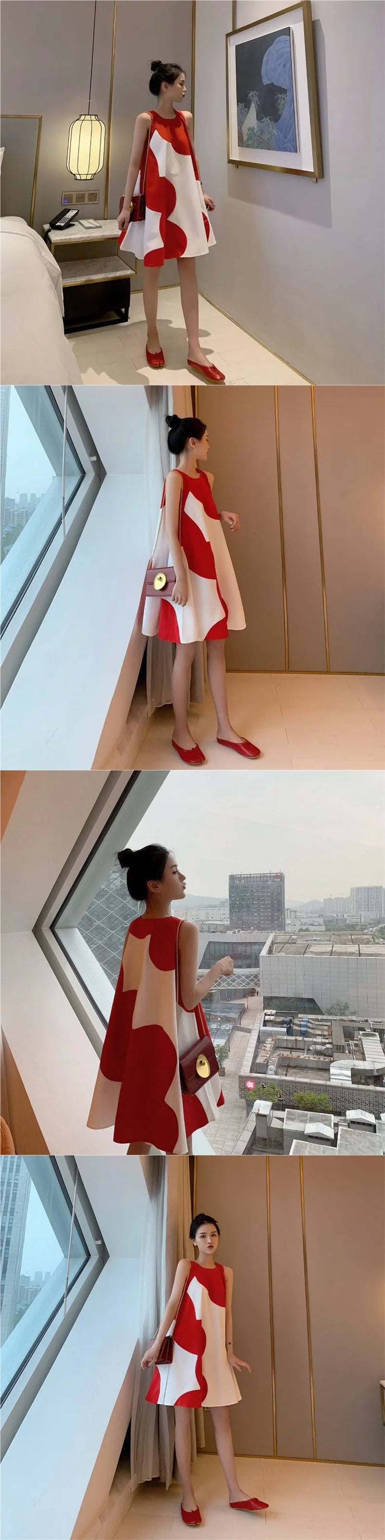 Model wearing a loose sleeveless red and white A-line maternity dress with a knee-length hem, showcasing summer style.