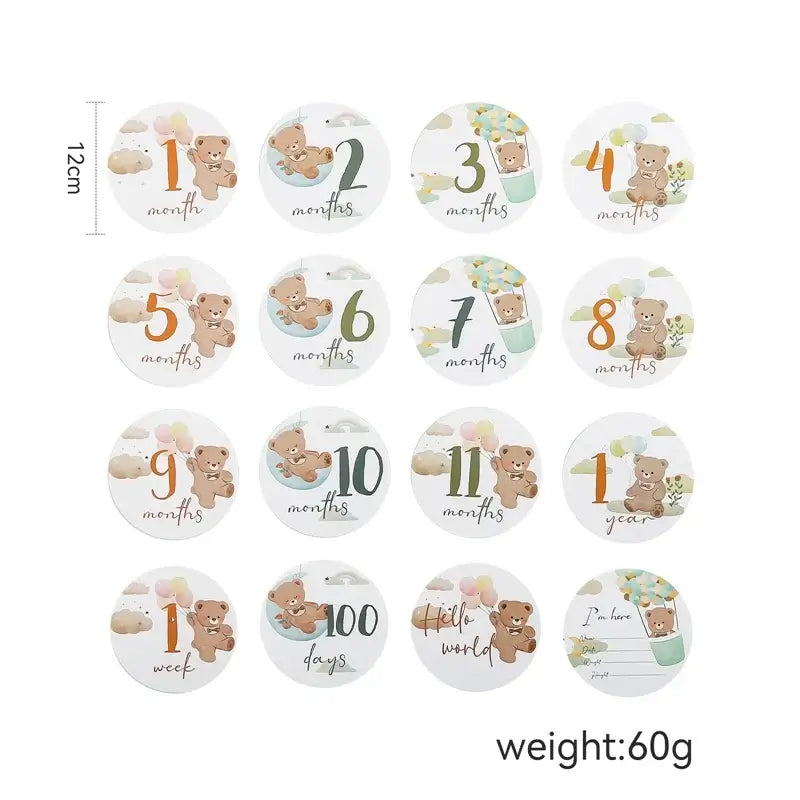 Set of 12 newborn milestone cards featuring cute animal designs, perfect for baby photography and monthly celebrations.