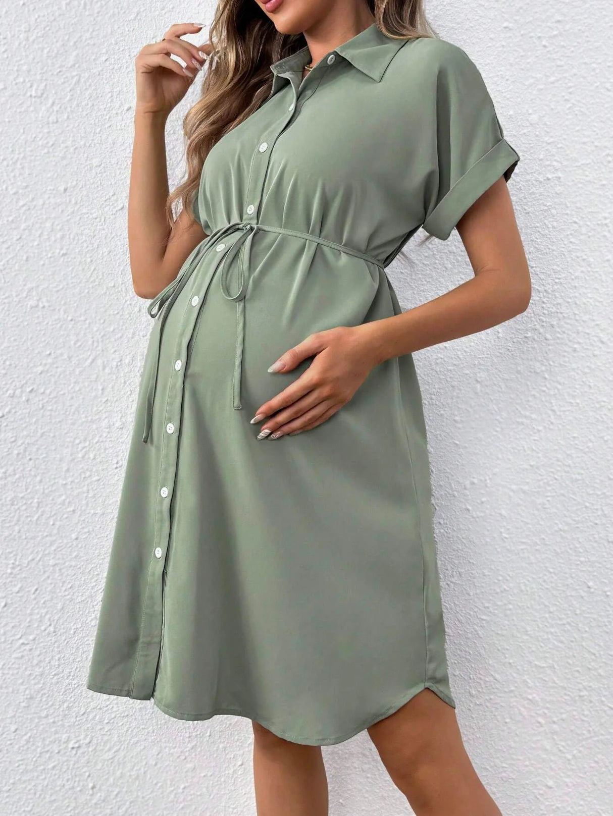 Striped button shirt maternity dress in casual summer style, featuring a comfortable fit and tie waist, ideal for expecting mothers.