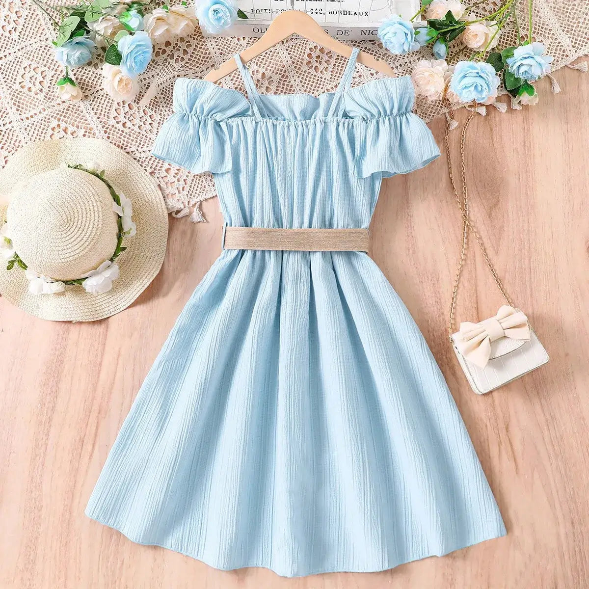 Girls casual one-shoulder strap dress in light blue with patchwork lace and belt, perfect for summer wear.