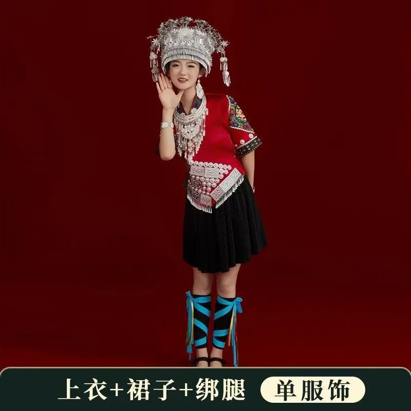 Miao embroidery festival costume for women, showcasing traditional design elements and vibrant colors, embodying cultural heritage.
