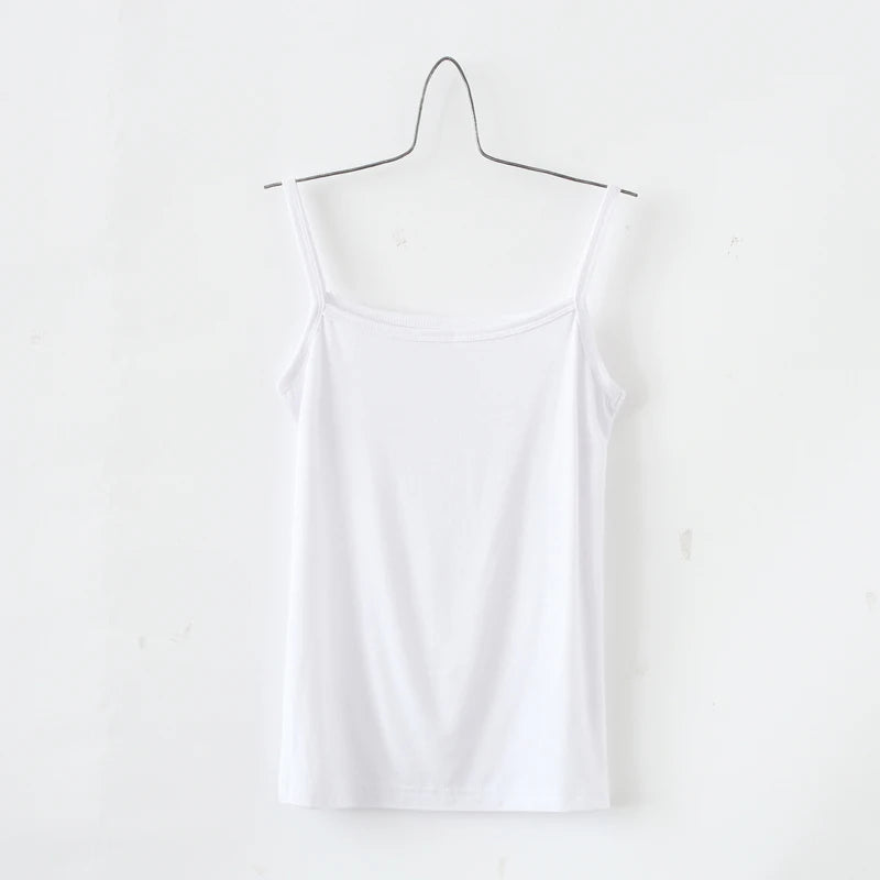 BasicBreeze™ white solid cotton strap camisole hanging on a minimalist hanger.