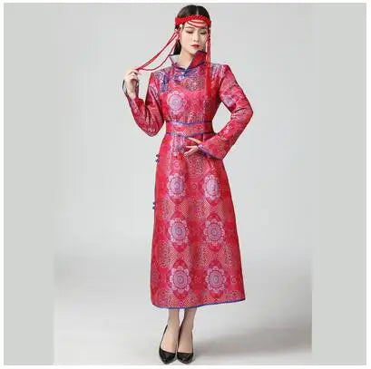Mongolian ethnic women’s traditional dress in vibrant red with intricate patterns and full sleeves.